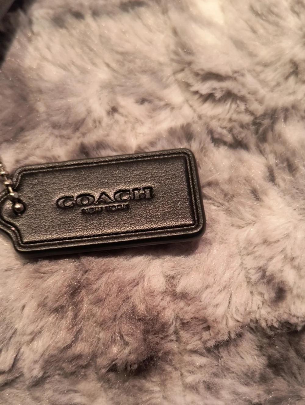 Coach top subtle signature